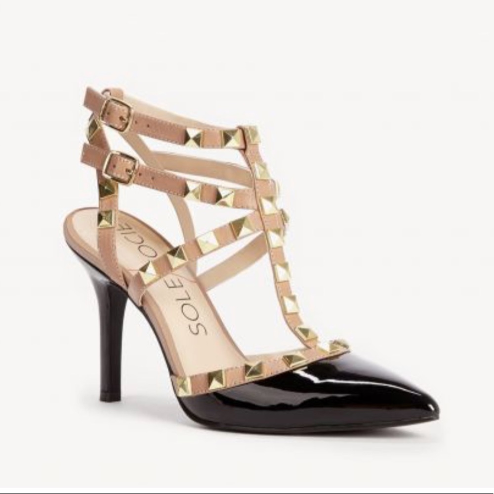 Tan and black studded pumps